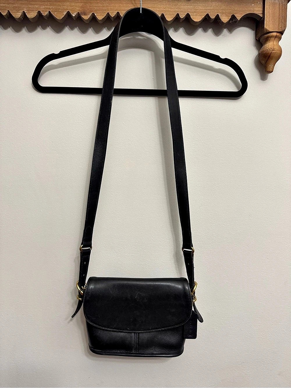 Vintage 90s COACH Equestrian Small Flap Bag crafted in black leather.